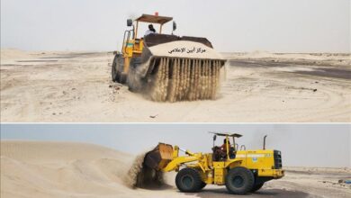 صندوق نظافة أبين يزيل الرمال المتحركة من على الطريق الدولي