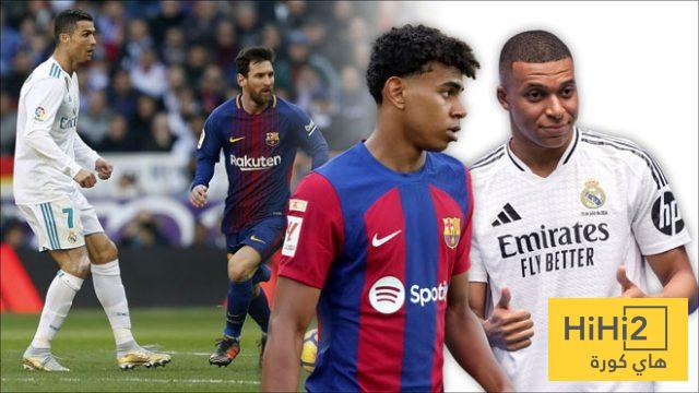 صورة .. مشجع برشلوني بقميص لامين في متجر الريال أمام الرقم 10